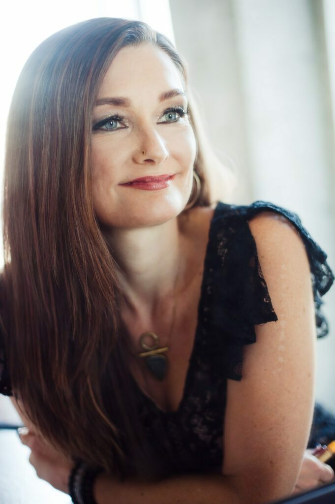 Sagarra smiling with red lipstick