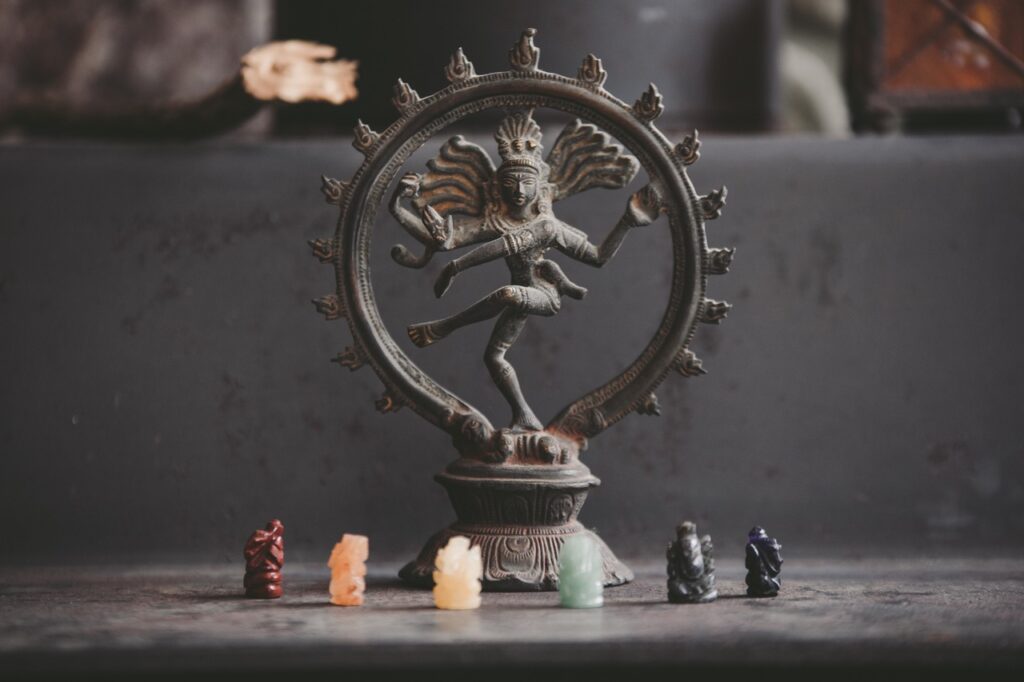 Indian-style wheel-statue and some smaller objects.