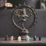 Indian-style wheel-statue and some smaller objects.