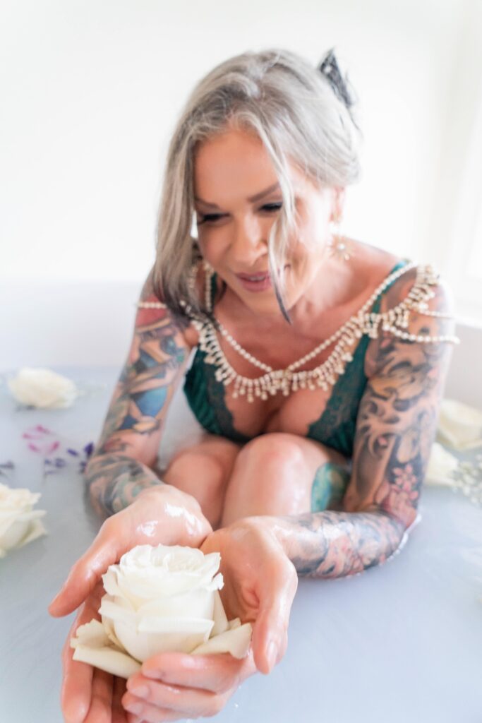Arabella holding a flower