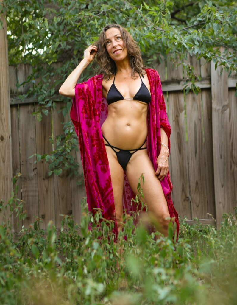 Lauren standing in the garden