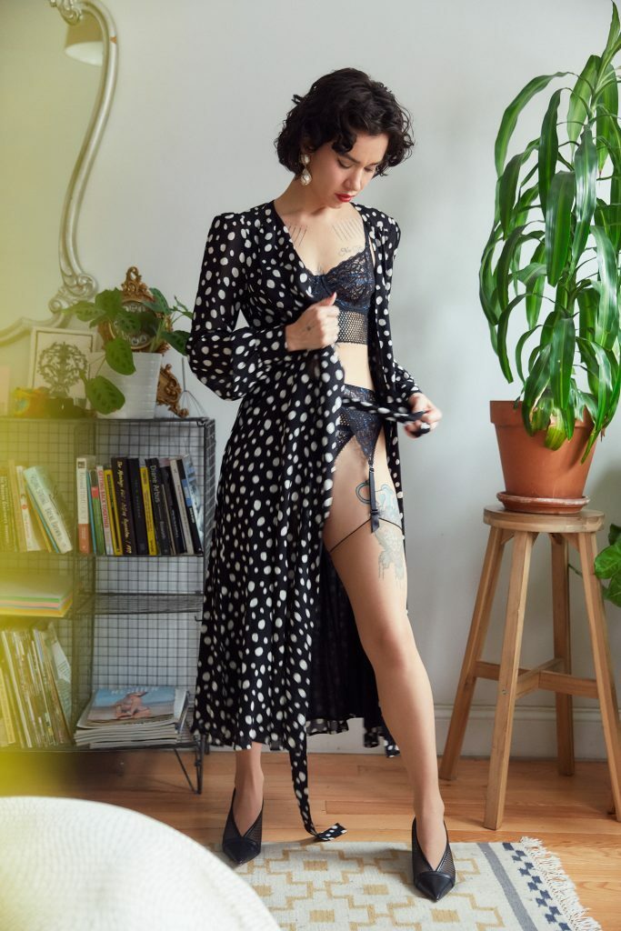 Jesse rearranging her dress