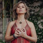 Simone holding her hands over her chest