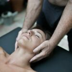 Cliff The Daka holding the head of the client