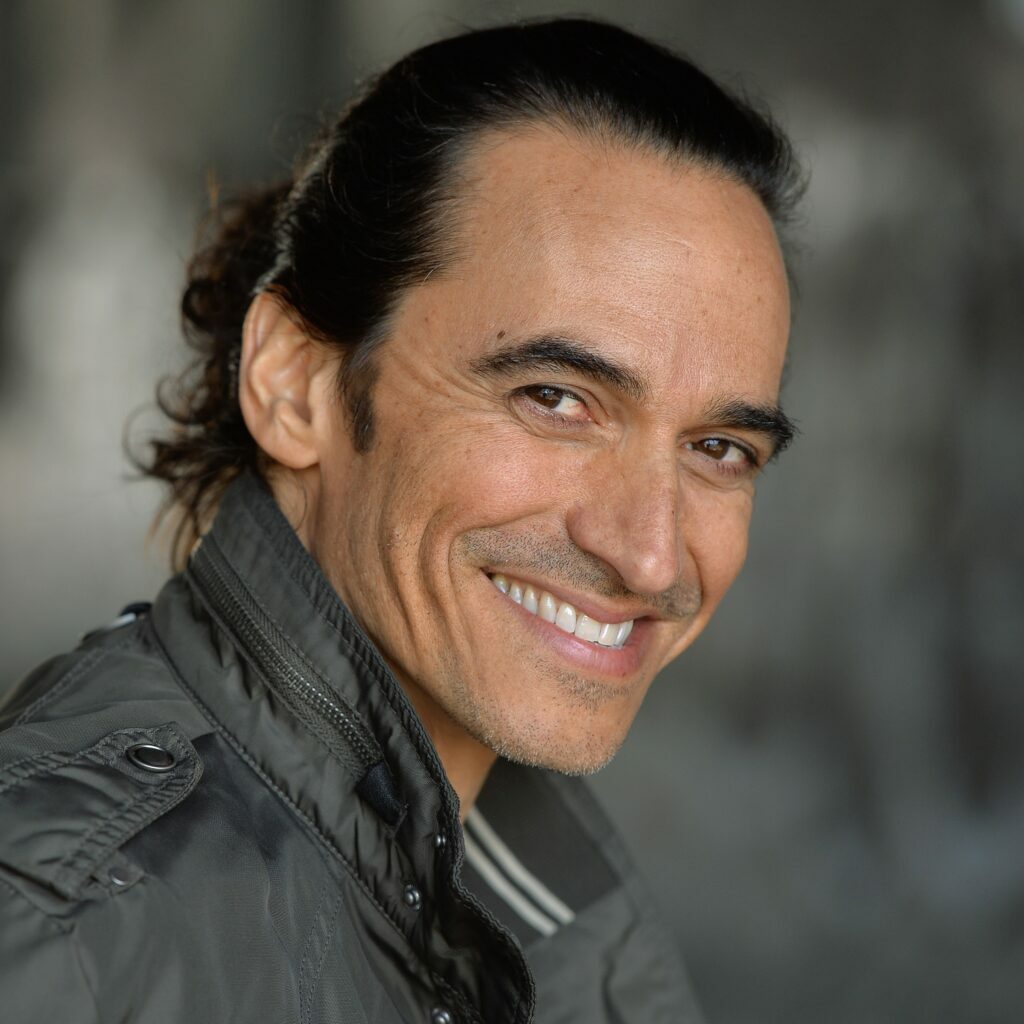 Diego Wallraff smiling and looking into the camera