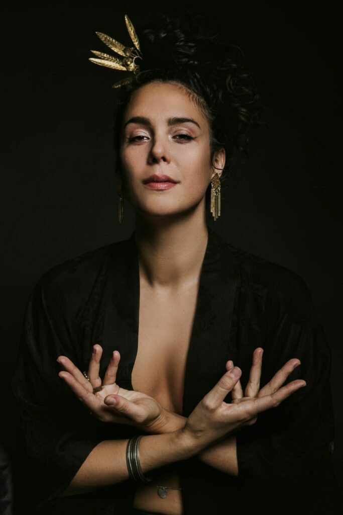 Sexual Mystic with her arms crossed