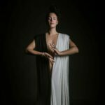 Sexual Mystic standing tall in white and black