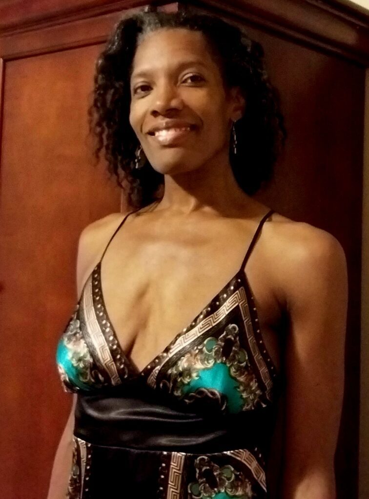 Jasmine Heart smiling at the viewer
