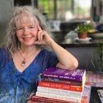 At the table with some books