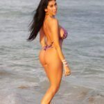 Posing on the beach in a bakini