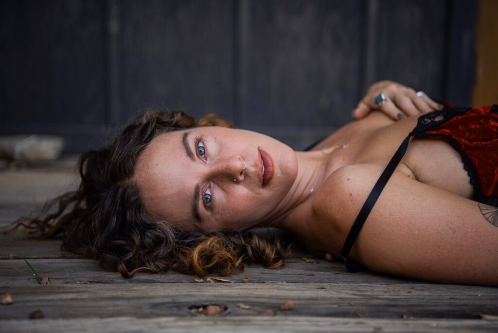 Close up of her face lying down.