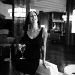 Rubystar laughing in a black dress
