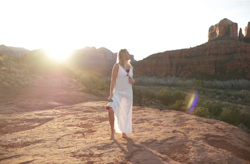 Aurora Love with the sunset behind her