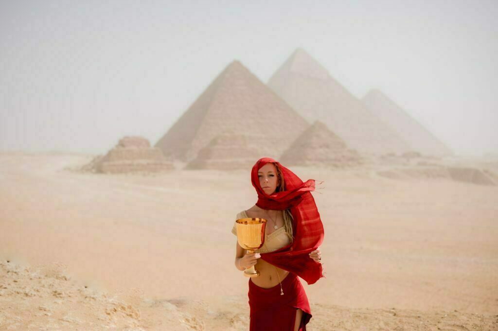 Standing in front of the pyramids of Ejypt