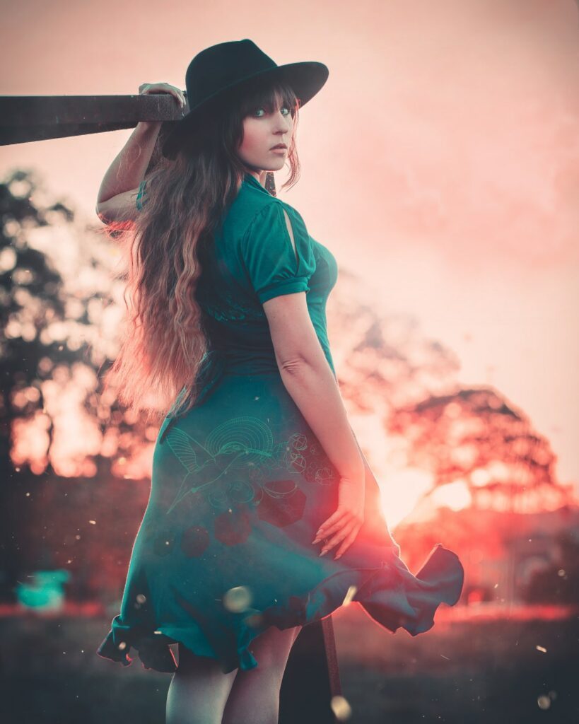 Grace Fonda holding a bit of wood