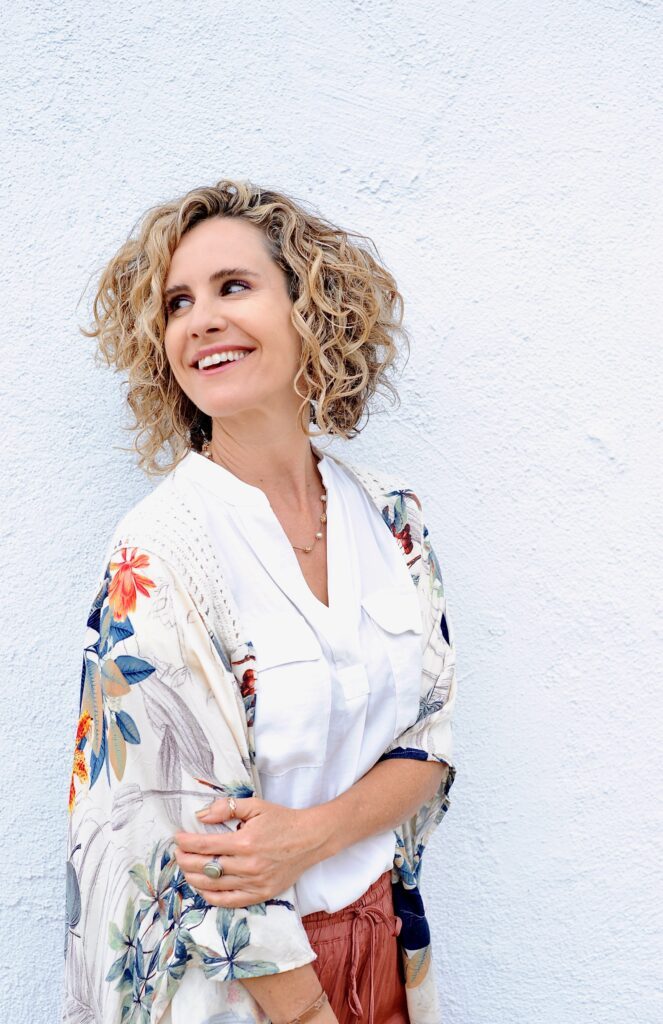 Clair Joy dressed in a white garment