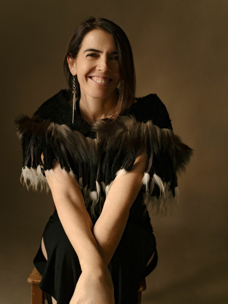 Janelle wearing feathers on her dress