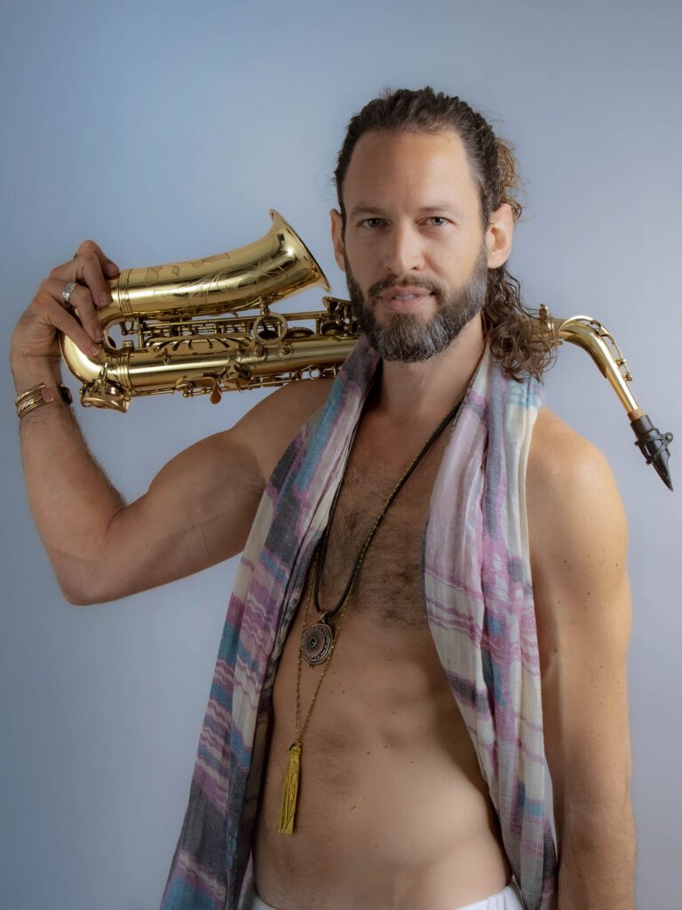 Jehiah with a saxophone