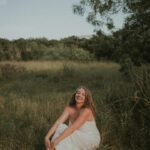 Anastasia Allington sitting in the grass