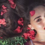 Gina Marie surrounded by roses