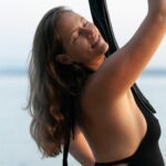 Priestess Hannah enjoying her body on the beach