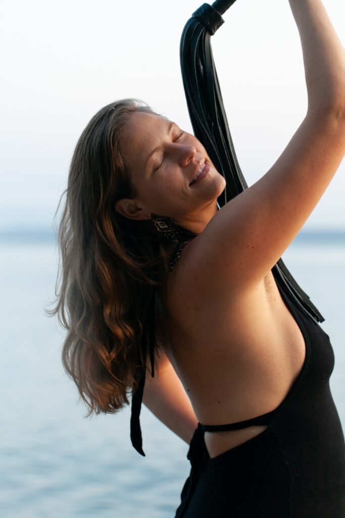 Priestess Hannah enjoying her body on the beach