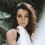 Naiyana Raine looking deeply into the camera