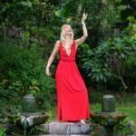 Nathalia in a red dress