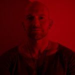 Andre Lazarus pictured in deep red