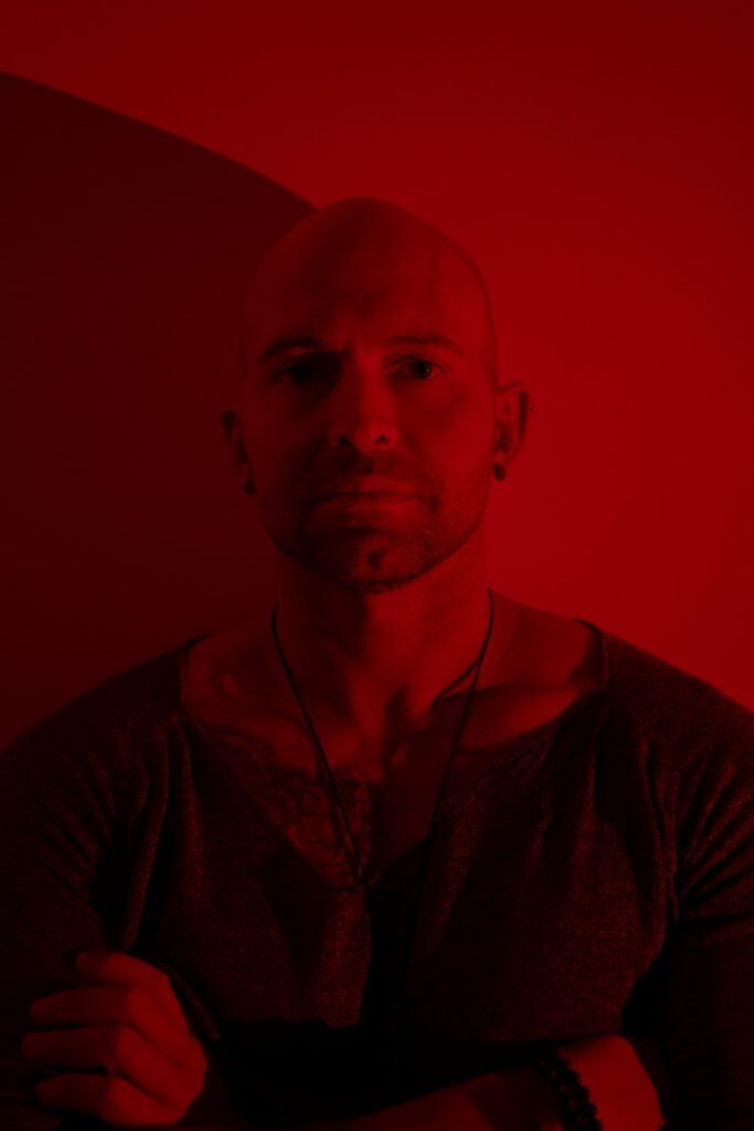Andre Lazarus pictured in deep red