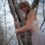Samantha Love with a tree