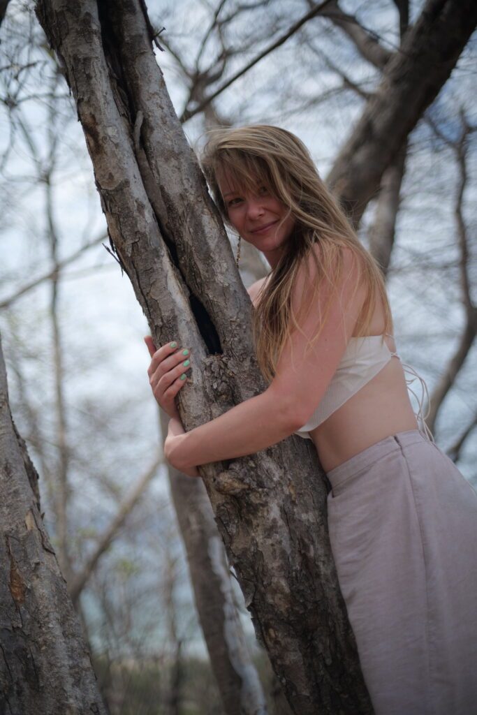 Samantha Love with a tree