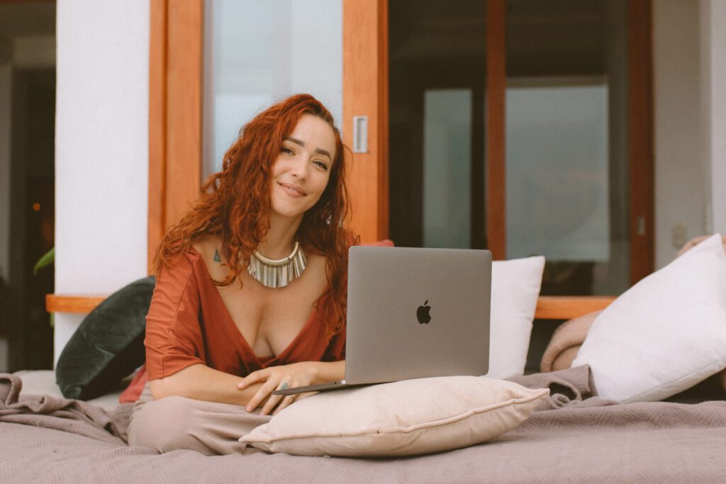 Yulia Rose using her laptio