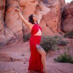 Yulia Rose in front of some rocks