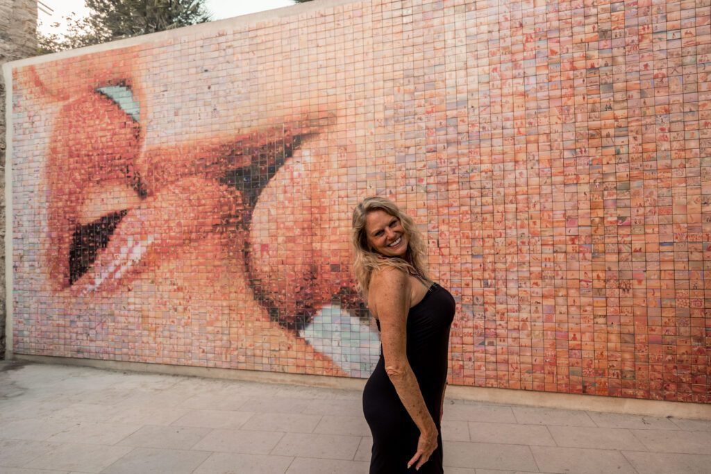 In front of some art work