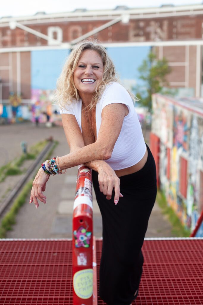 Carol leaning on a rail