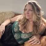 Seriph in a green webbed-top on an armchair.