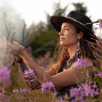 Seraphina on a field with fireweeds.