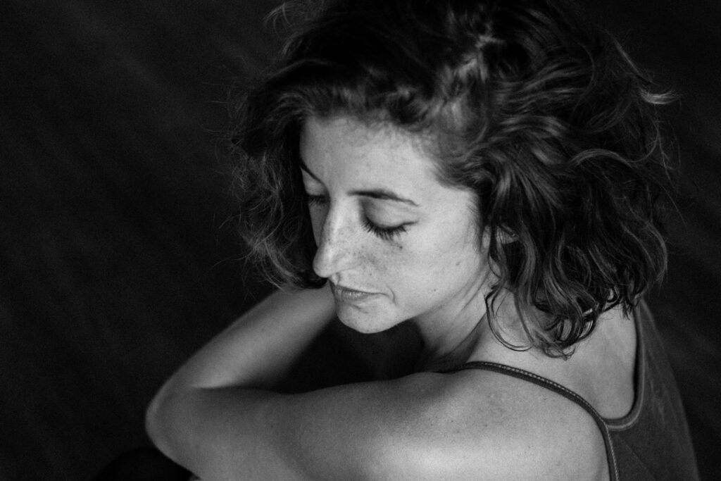 Close-up of Remi Taylor with her eyes closed.