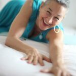Big smile, blue dress. Luminara on the bed.