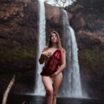 Juliette by a waterfall.