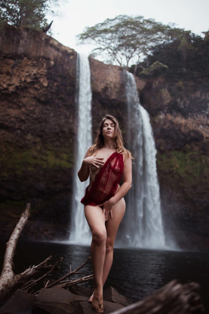 Juliette by a waterfall.