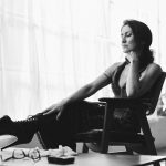 Contemplative Kalika with high heels.