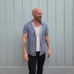 Kinsey stading in a casual outfit.