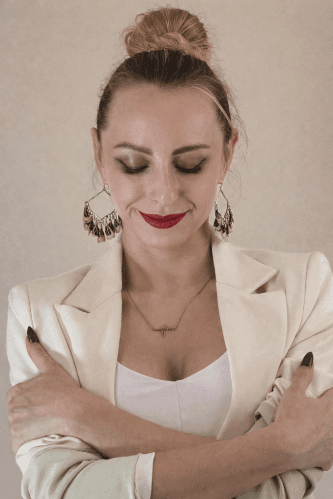 Natalia formal outfit eyes closed red lips.