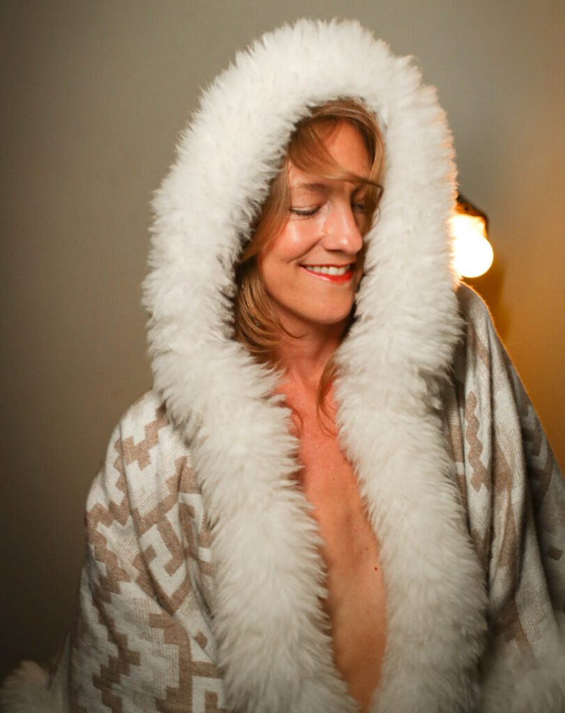 Mdame Reya Luz in a fur-front coat.