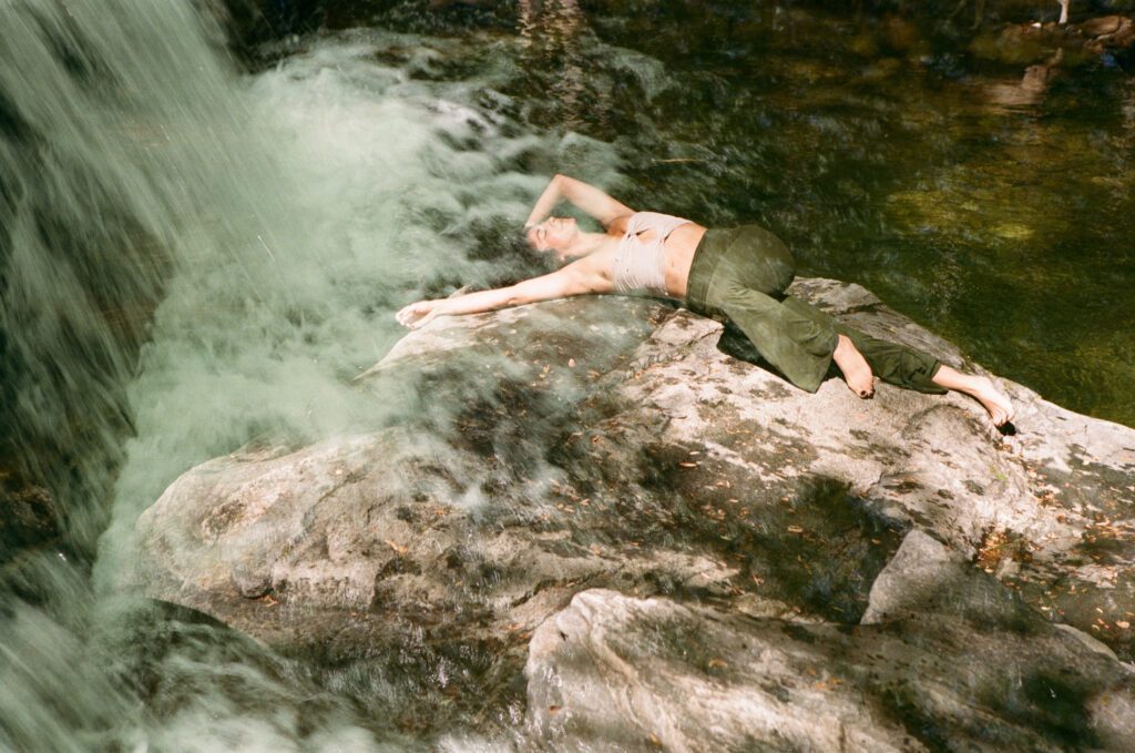 Chillin´ on a big rock next to a waterfall.