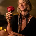 Holding a red rose