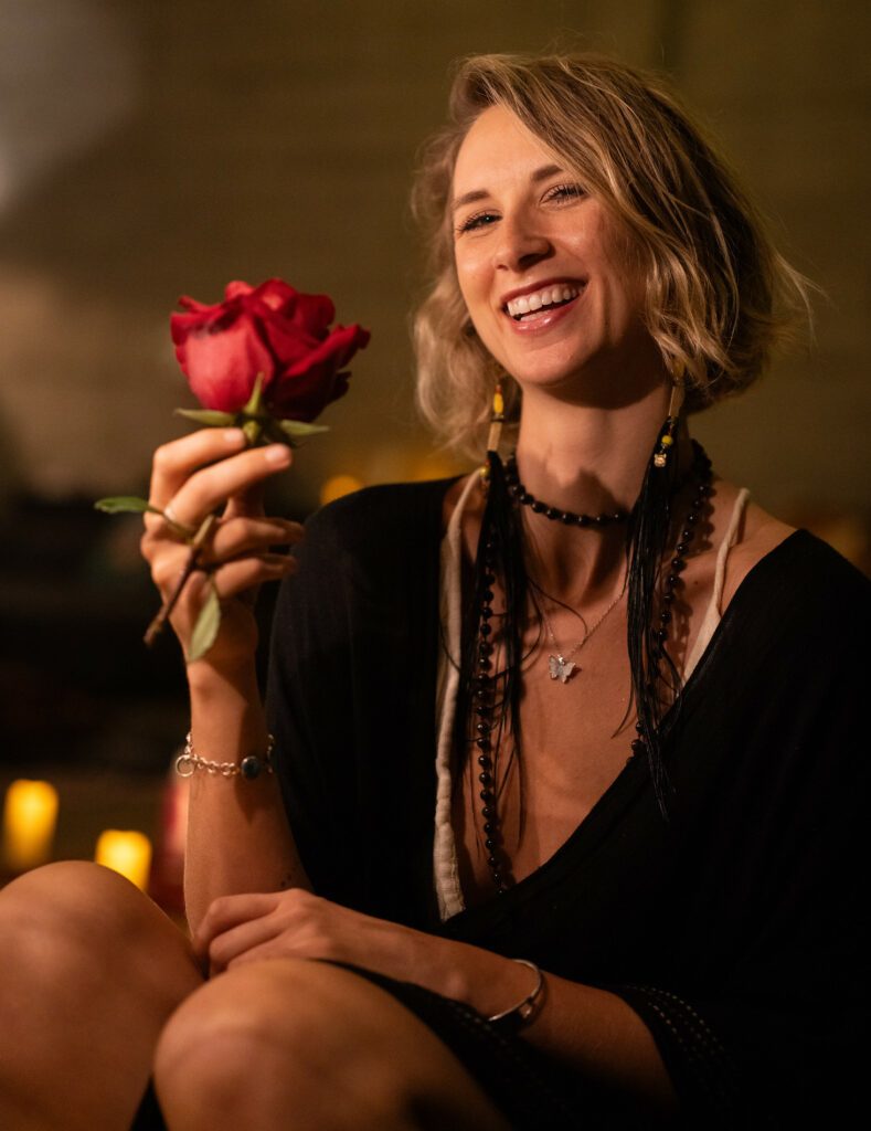Holding a red rose